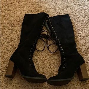 Black high heel calf length boots
